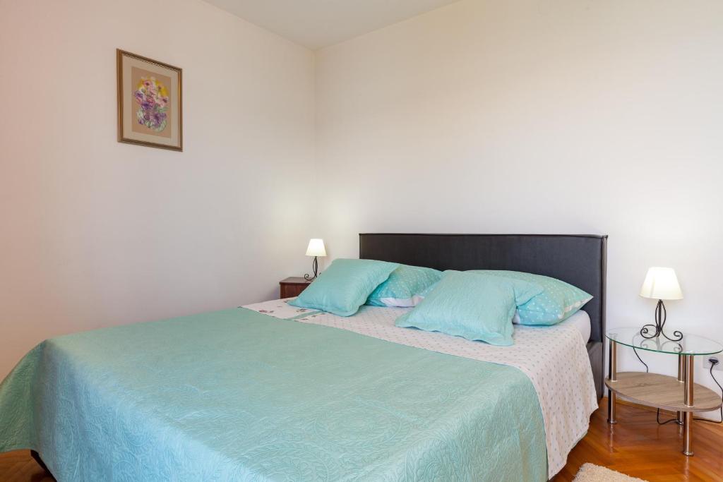 Postel nebo postele na pokoji v ubytování Rooms Marinac