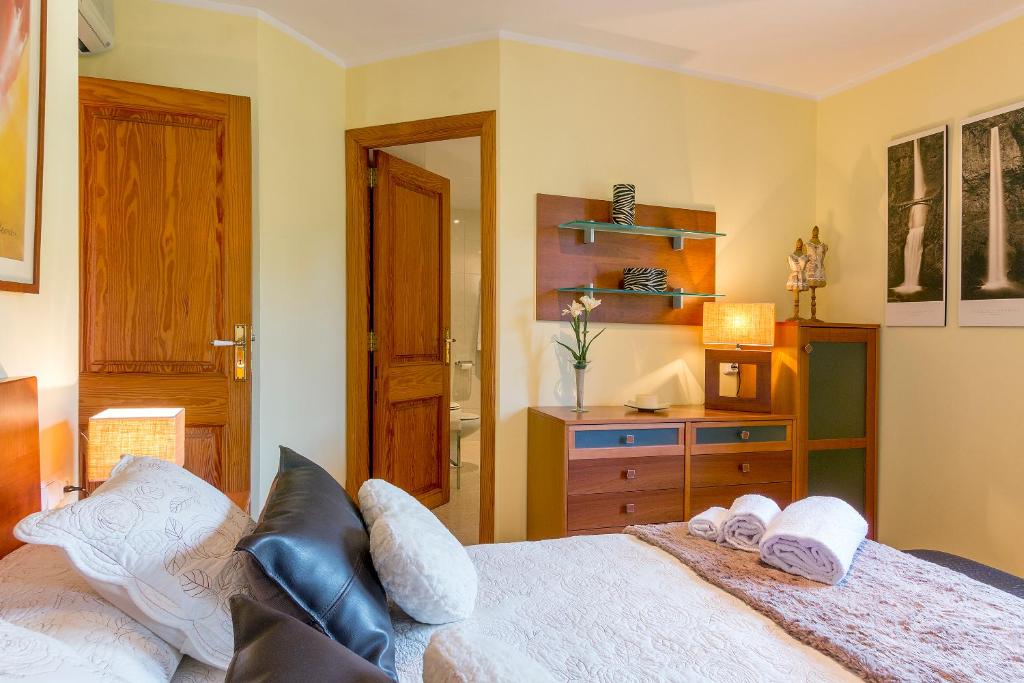 Postel nebo postele na pokoji v ubytování Ca Na Rosa