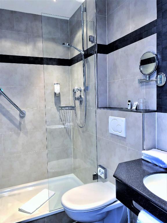 Koupelna v ubytování Hotel Sylter Blaumuschel