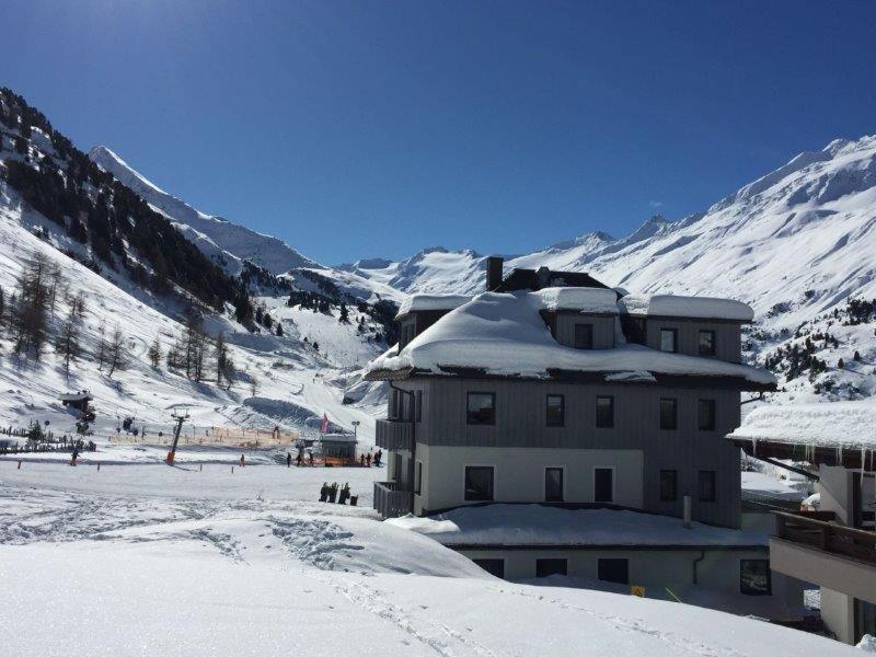 a building with snow on top of a snow covered mountain at Haus Christophorus in Obergurgl