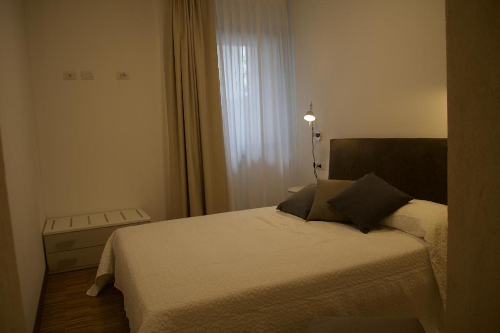 Кровать или кровати в номере B&B Mare di Fuori
