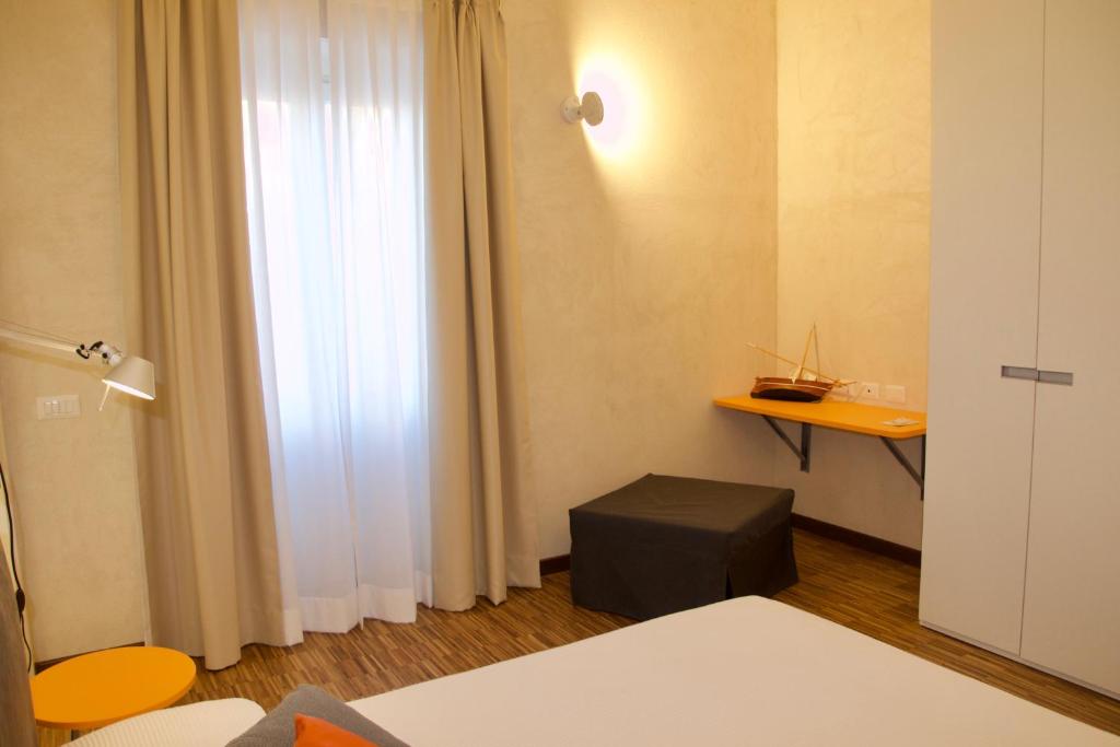 Кровать или кровати в номере B&B Mare di Fuori