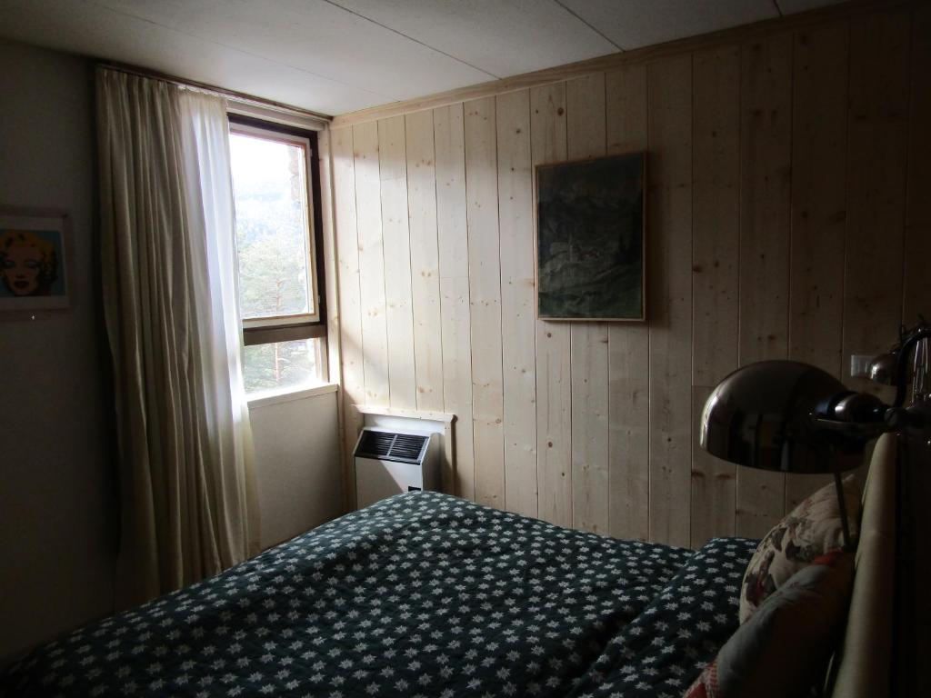 Postel nebo postele na pokoji v ubytování Chalet Vicino a Cortina