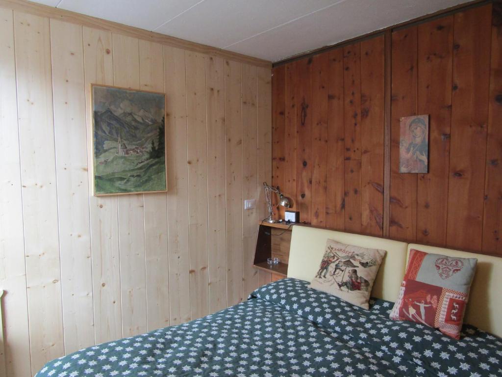 Postel nebo postele na pokoji v ubytování Chalet Vicino a Cortina