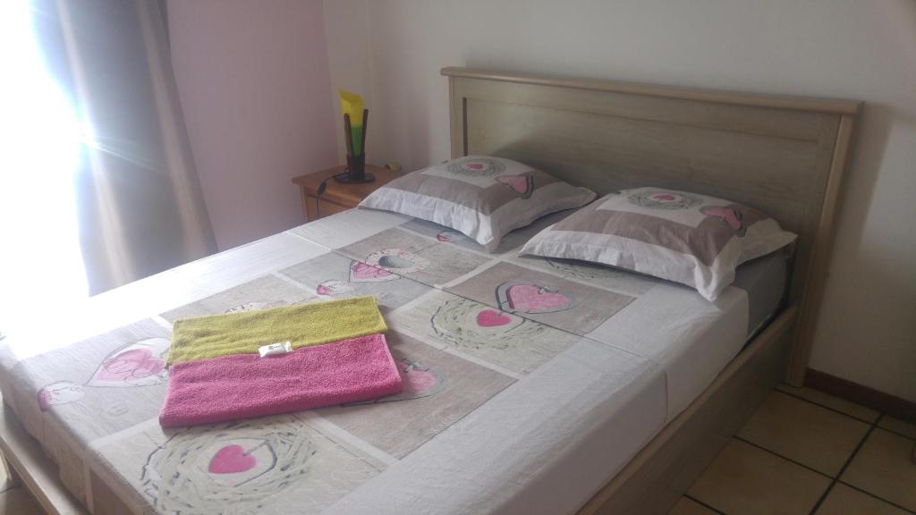 Ένα ή περισσότερα κρεβάτια σε δωμάτιο στο Le Cap Vert