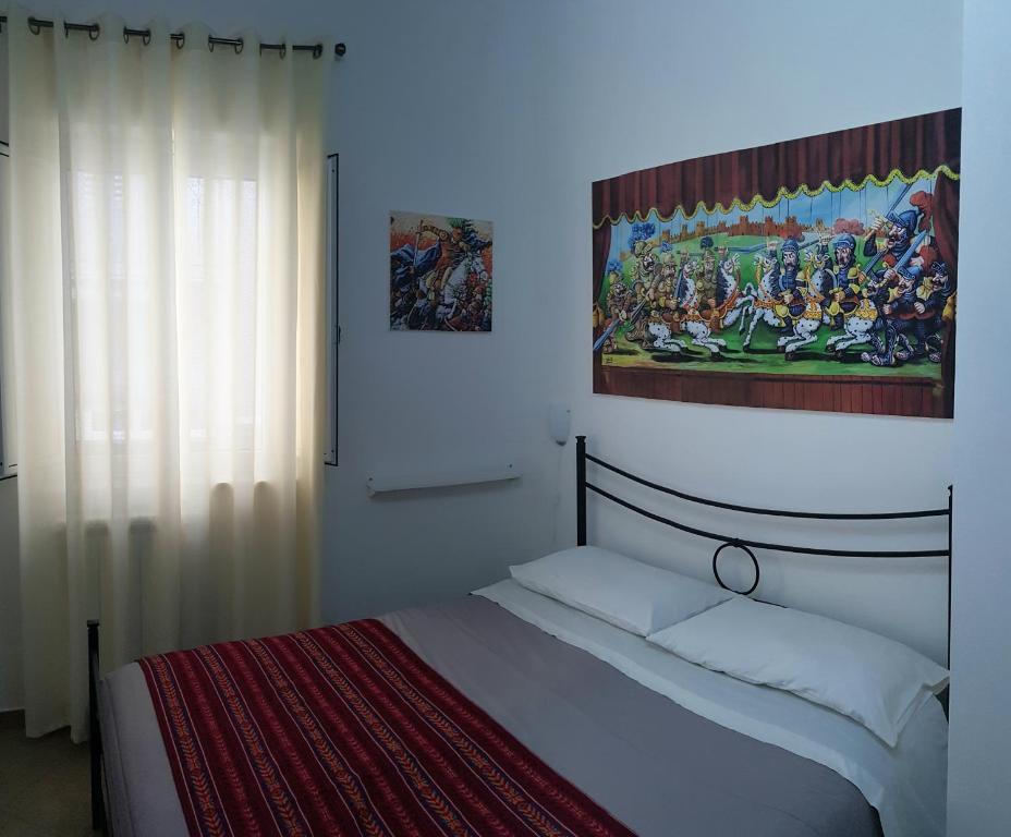 Postel nebo postele na pokoji v ubytování PalermiT'Amo