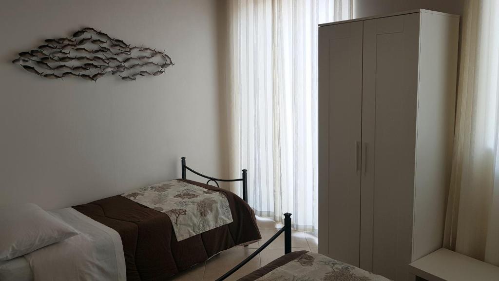 Postel nebo postele na pokoji v ubytování PalermiT'Amo