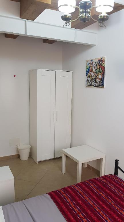 Postel nebo postele na pokoji v ubytování PalermiT'Amo