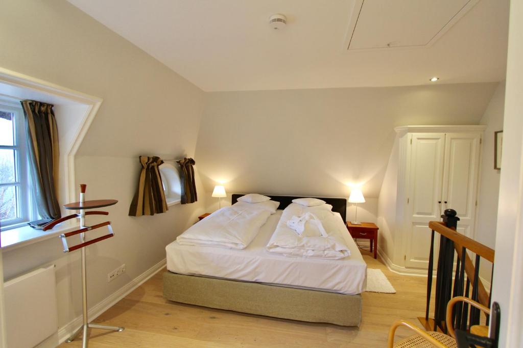 Postel nebo postele na pokoji v ubytování Ulenhof Appartements