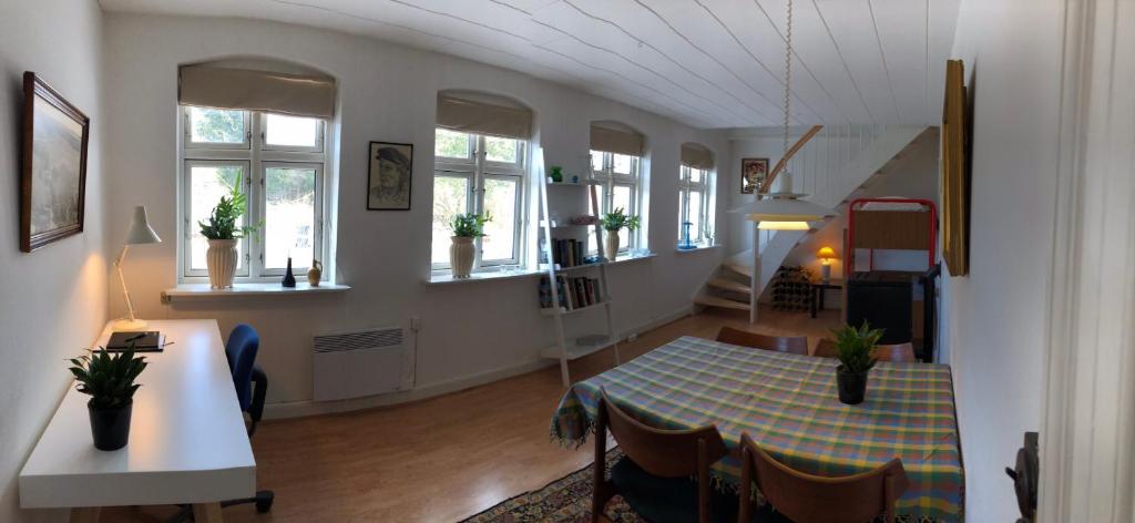 Posezení v ubytování Det lille røde hus