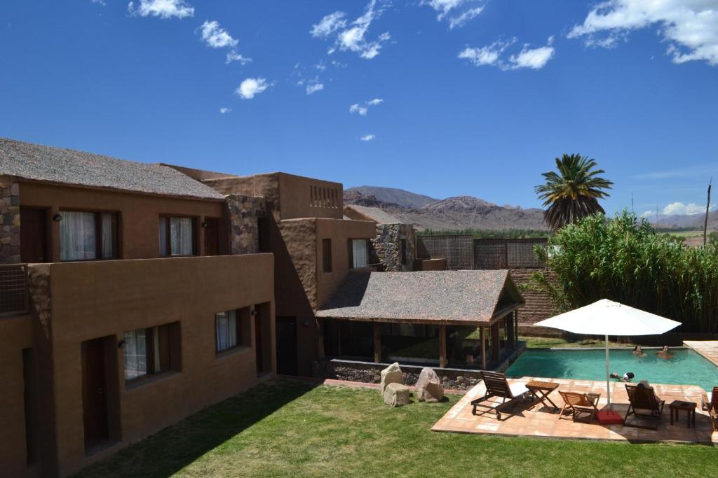 a view of a house with a swimming pool at Vientonorte in Tilcara