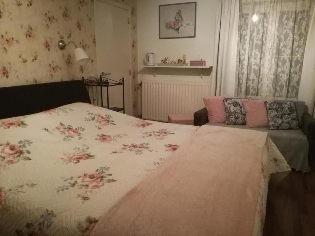 Postel nebo postele na pokoji v ubytování La Rose