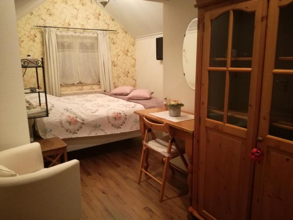 Postel nebo postele na pokoji v ubytování La Rose