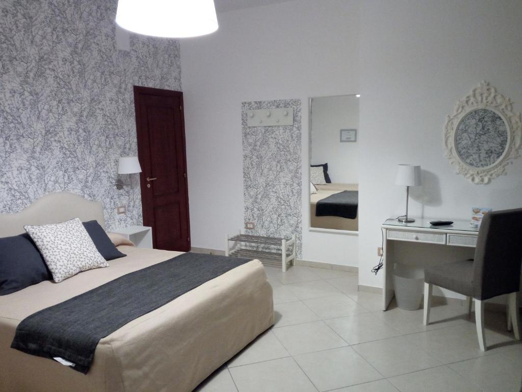 Postel nebo postele na pokoji v ubytování Mini Hotel - Angolo Di Paradiso -