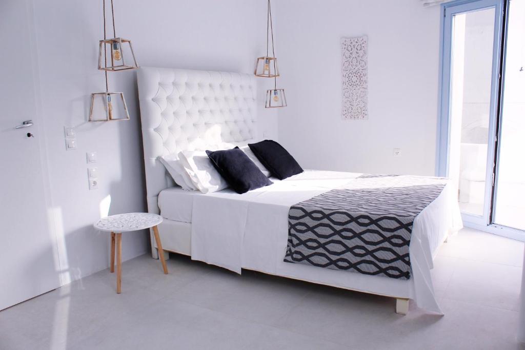 Postel nebo postele na pokoji v ubytování Aegean of Amorgos