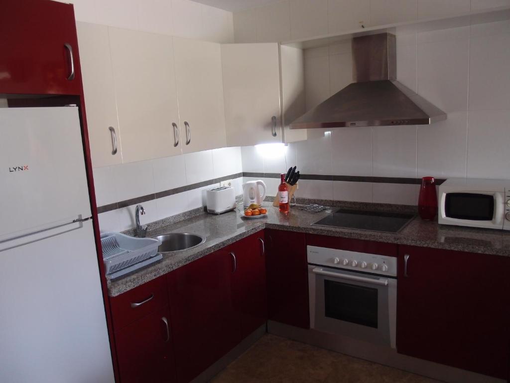 Kuchyň nebo kuchyňský kout v ubytování Luxury apartment in central Almerimar with Free Secure Parking