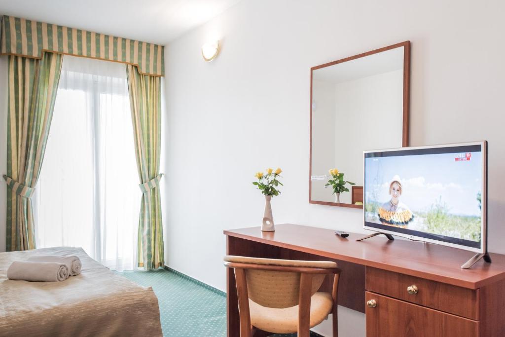 TV a/nebo společenská místnost v ubytování Hotel Krilo