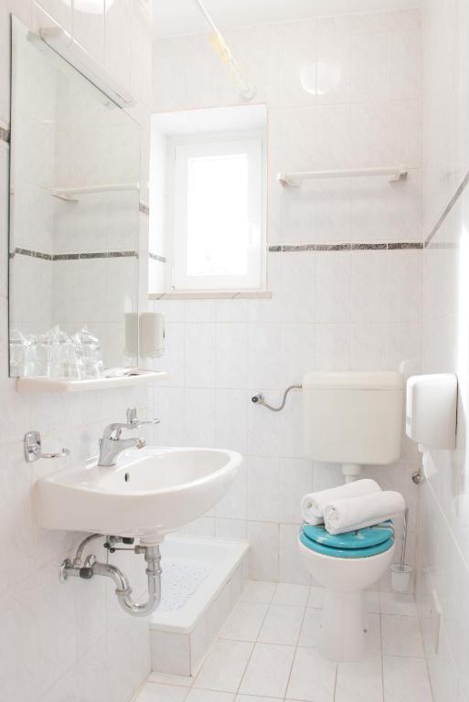 Koupelna v ubytování Hotel Krilo