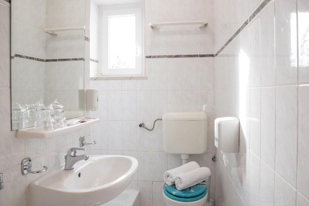 Koupelna v ubytování Hotel Krilo