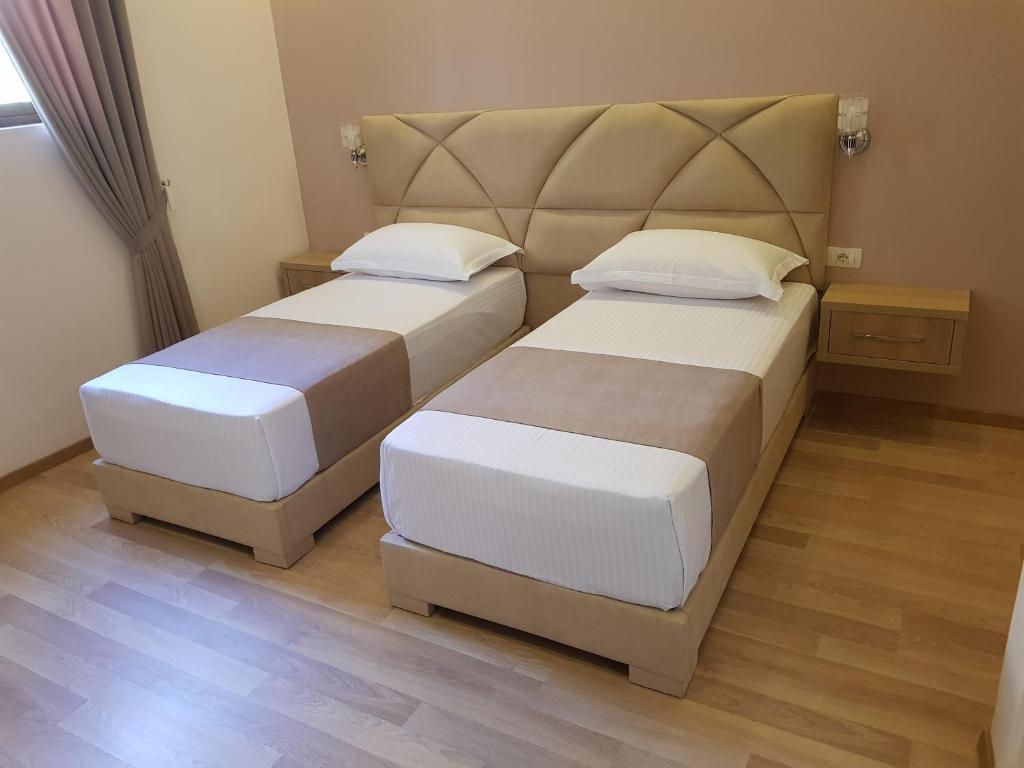Postel nebo postele na pokoji v ubytování Villa Arben Elezi