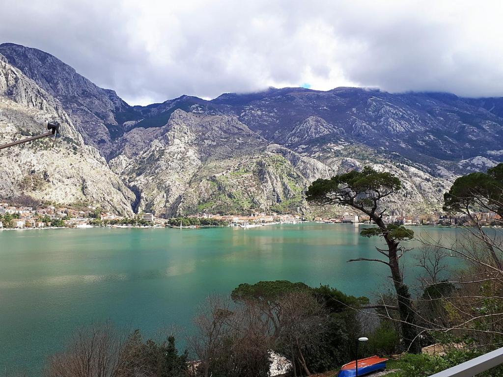 a view of a lake in front of a mountain at Apartment Sasha in Kotor