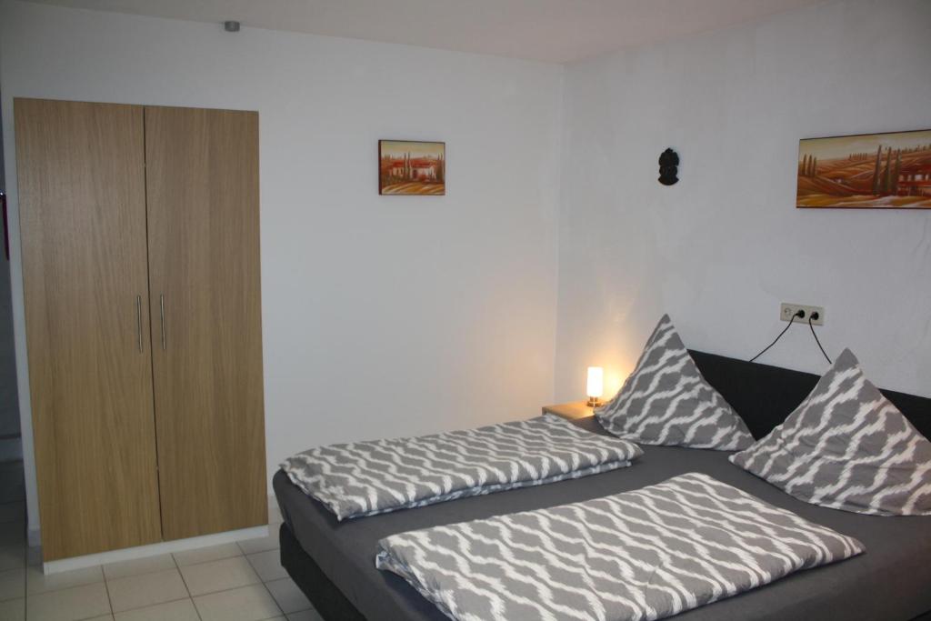 Postel nebo postele na pokoji v ubytování Ferienwohnung Ziemons