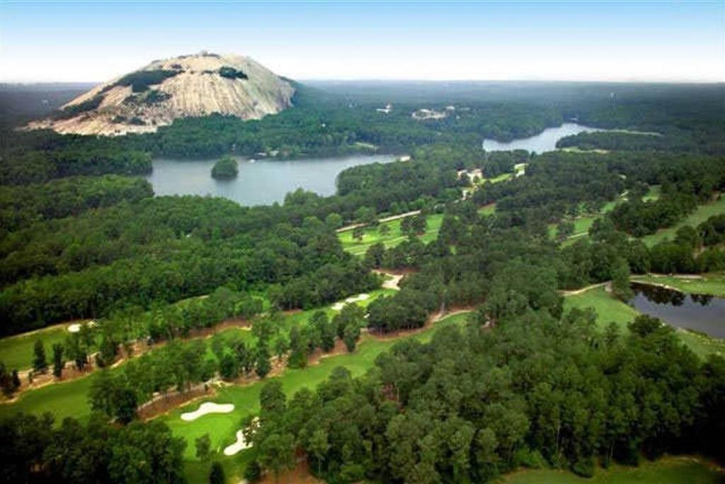 an aerial view of a golf course and a mountain at Mountain View GetAway in Stone Mountain