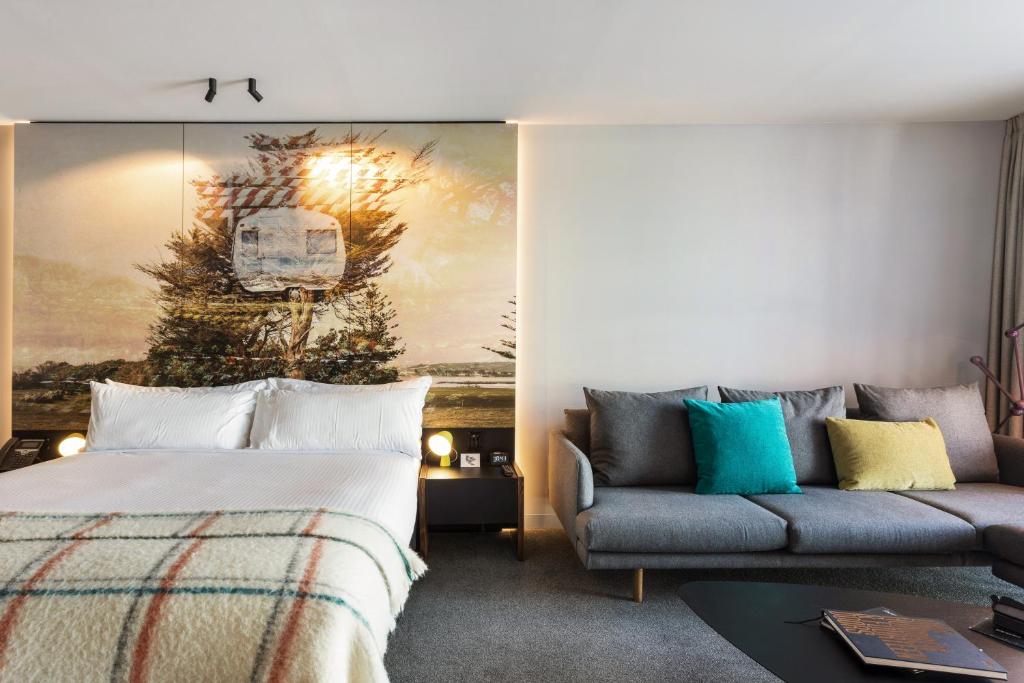Postel nebo postele na pokoji v ubytování MACq 01 Hotel