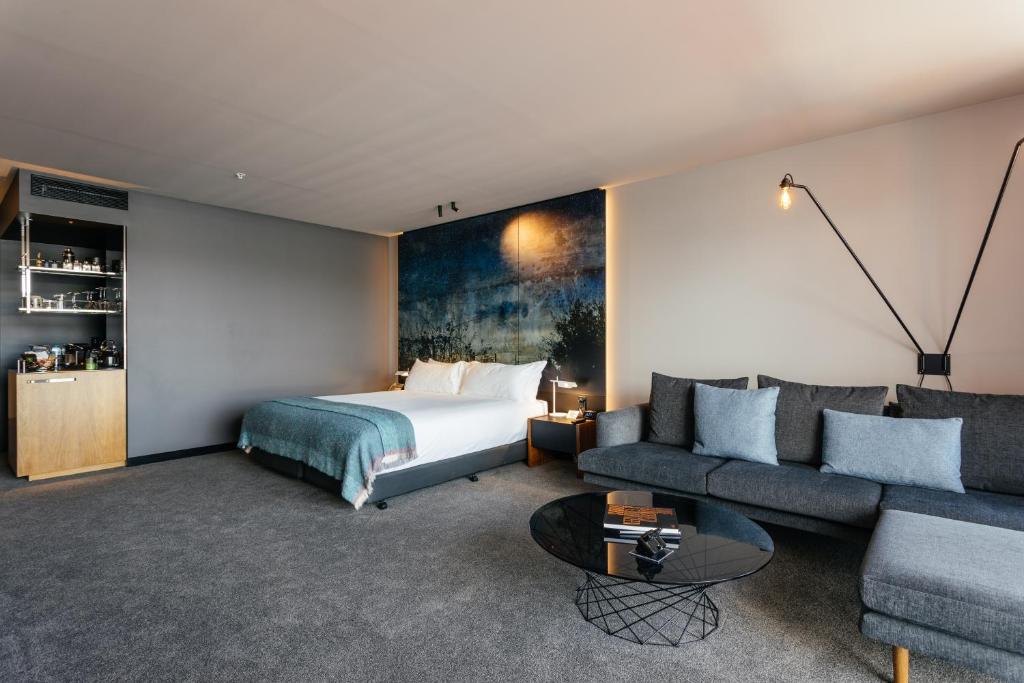 Postel nebo postele na pokoji v ubytování MACq 01 Hotel