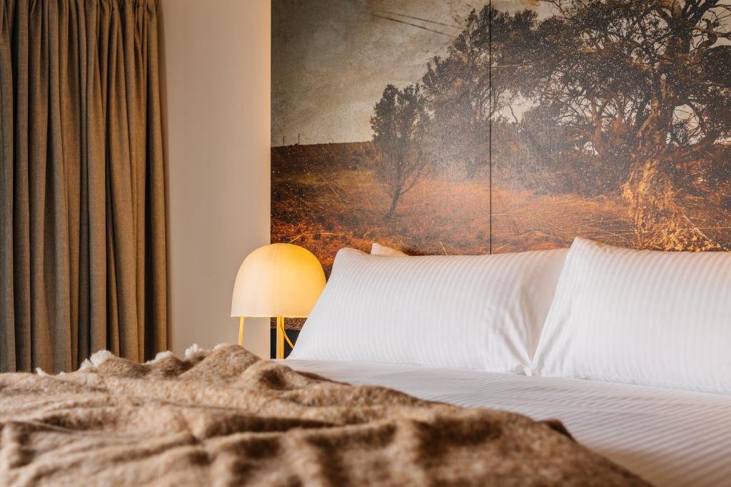 Postel nebo postele na pokoji v ubytování MACq 01 Hotel