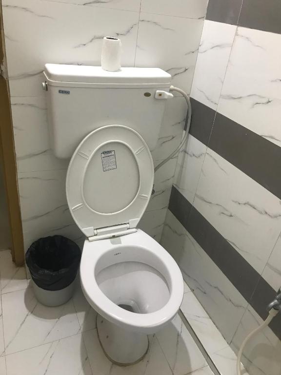 Koupelna v ubytování Suvarna Residency