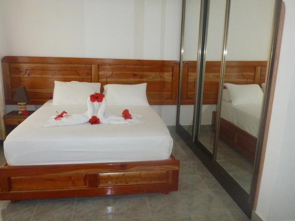 Postel nebo postele na pokoji v ubytování Jamelah Beach Guest House