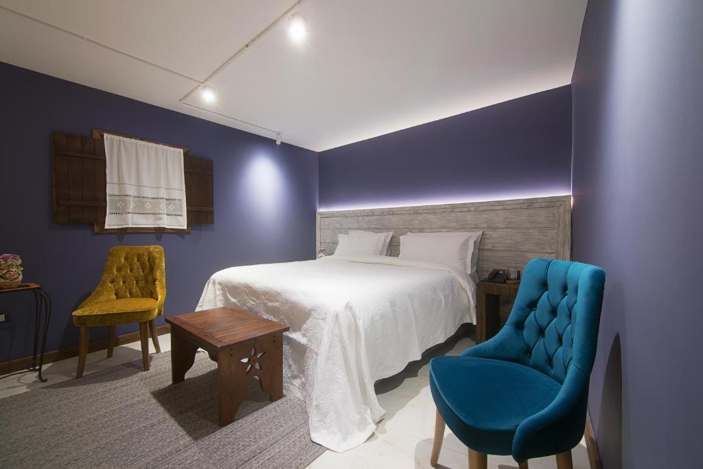 Uma cama ou camas num quarto em HANI I PAZARIT Boutique Hotel