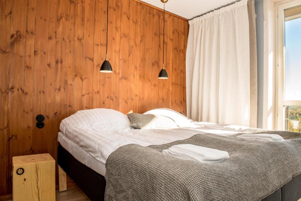 Postel nebo postele na pokoji v ubytování Bergshotellet