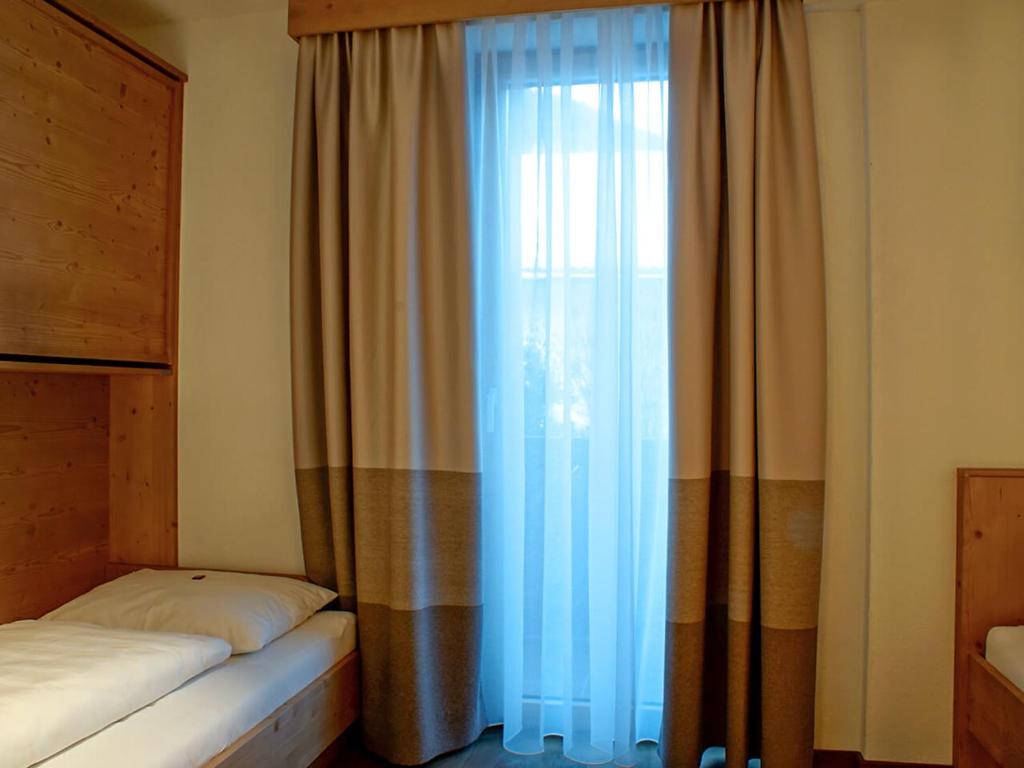Postel nebo postele na pokoji v ubytování Gästehaus Prock