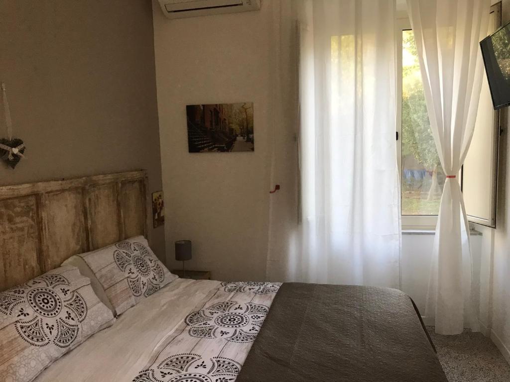 Posteľ alebo postele v izbe v ubytovaní Il Giardino Di Vico Neve
