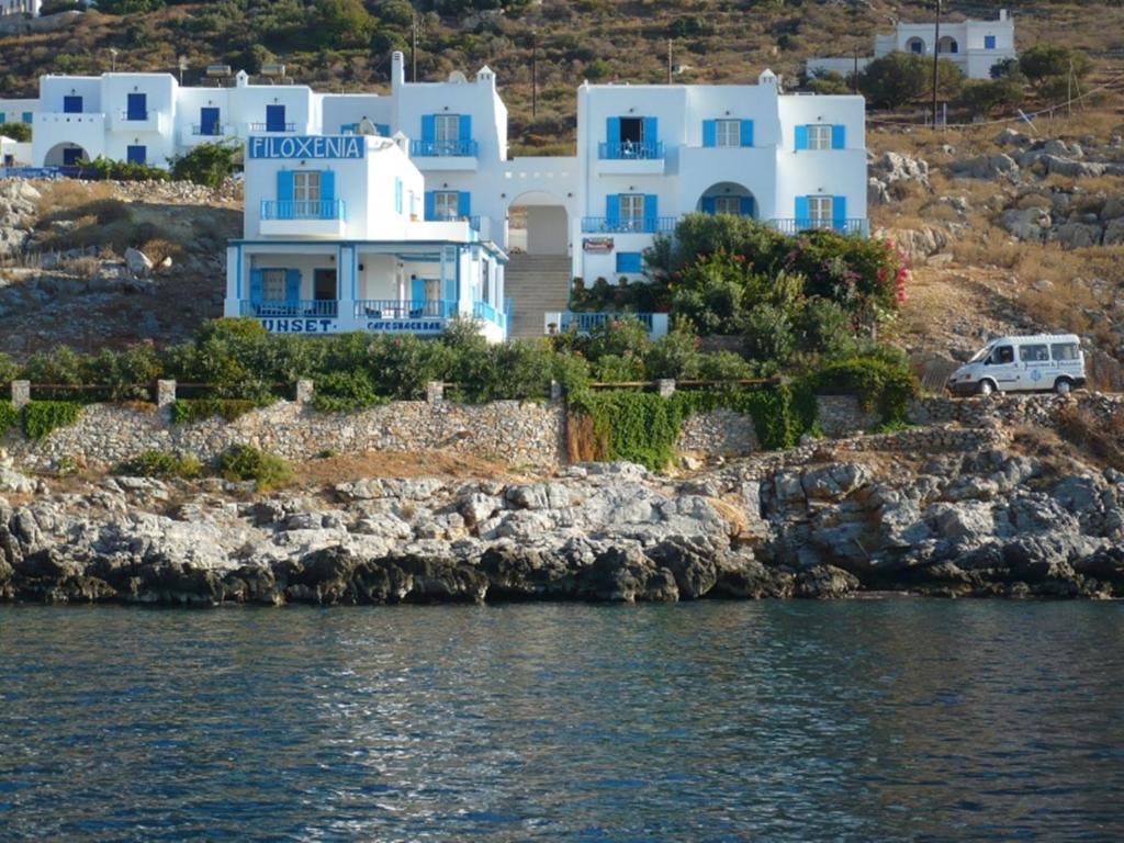 a view of a house from the water at Hotel Filoxenia in Aegiali