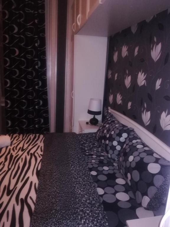 Postel nebo postele na pokoji v ubytování Nikoloz Guesthouse