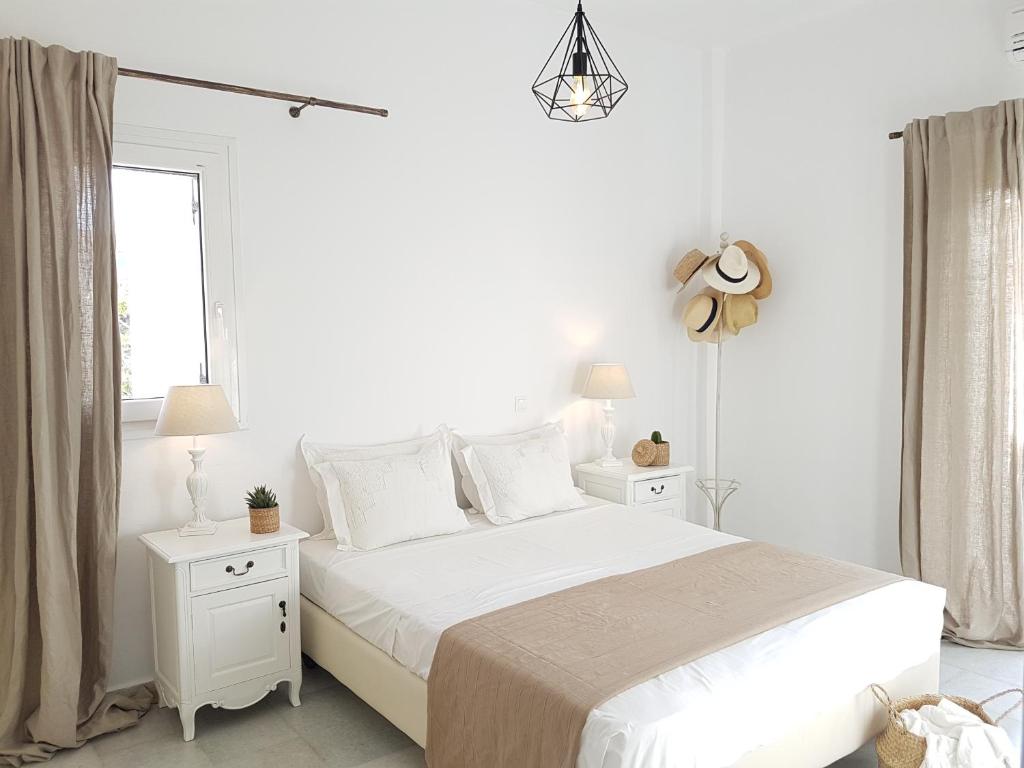 Postel nebo postele na pokoji v ubytování Artemis Sunny Villa