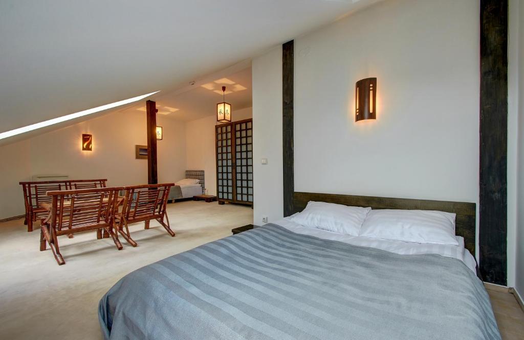 Postel nebo postele na pokoji v ubytování Aerohotel
