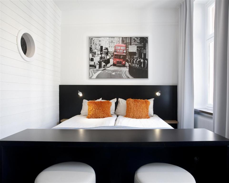 Postel nebo postele na pokoji v ubytování Hotel Örebro