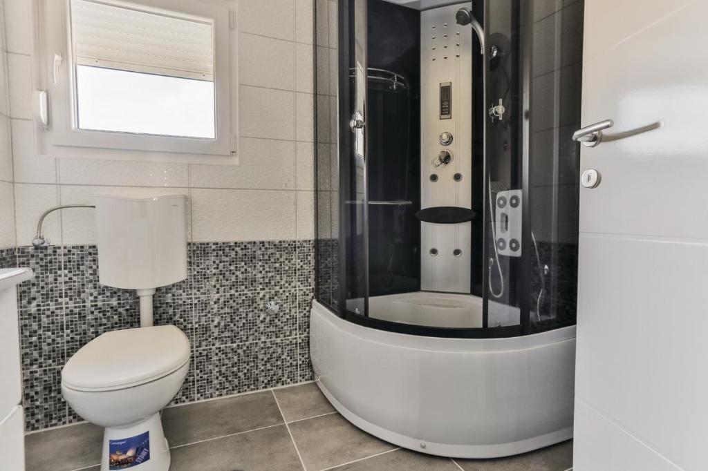 Kúpeľňa v ubytovaní Villa Scandalli