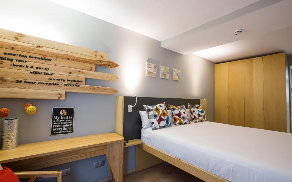 Posteľ alebo postele v izbe v ubytovaní Yeah Barcelona Hostel
