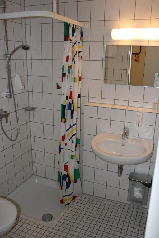 Koupelna v ubytování Seminarhotel Jakobsberg