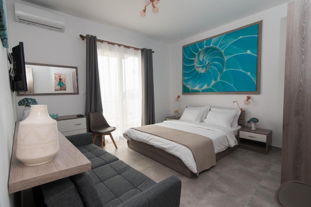 Posteľ alebo postele v izbe v ubytovaní Olive House Apartments