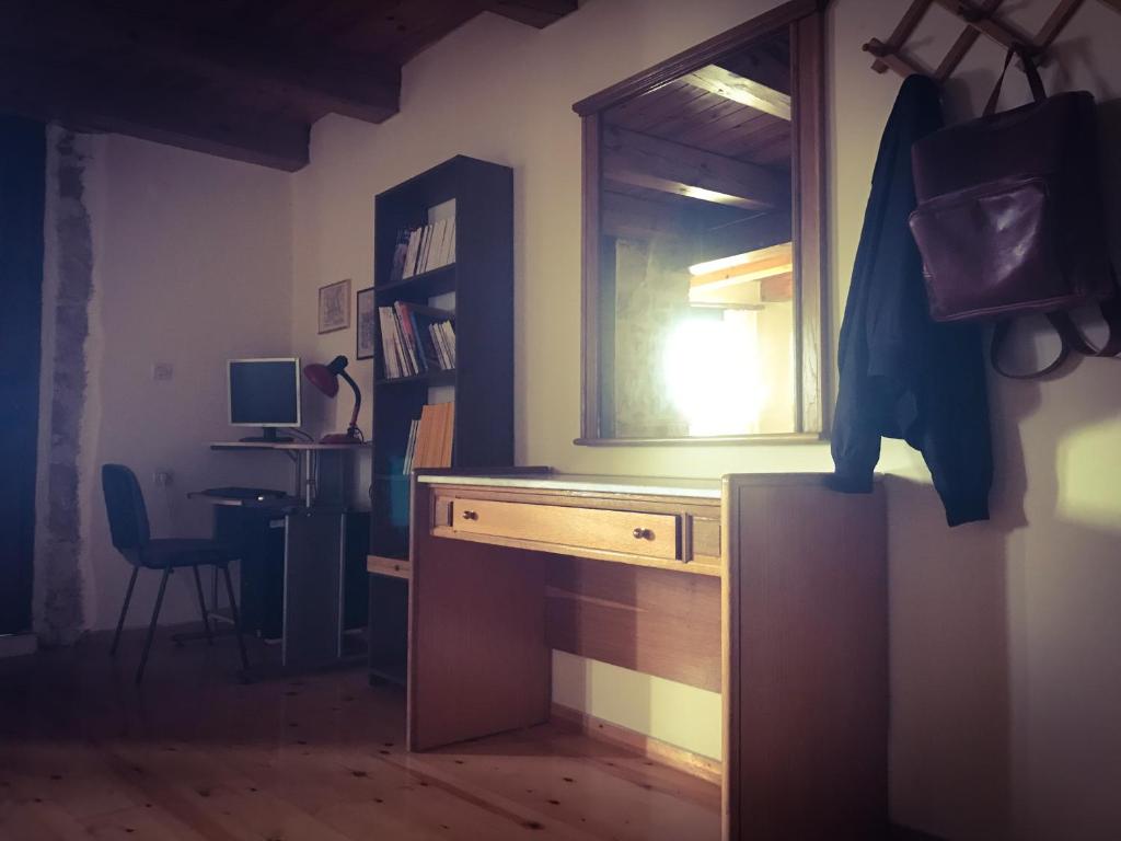 A television and/or entertainment centre at Antonia’s Home Alfa Village