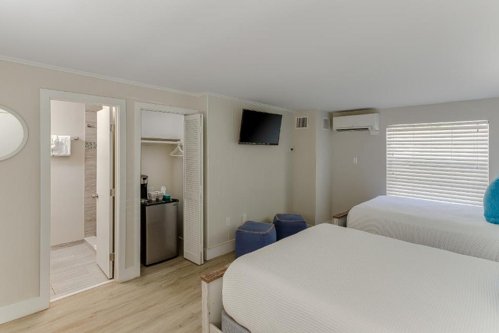 Postel nebo postele na pokoji v ubytování Drift Hotel