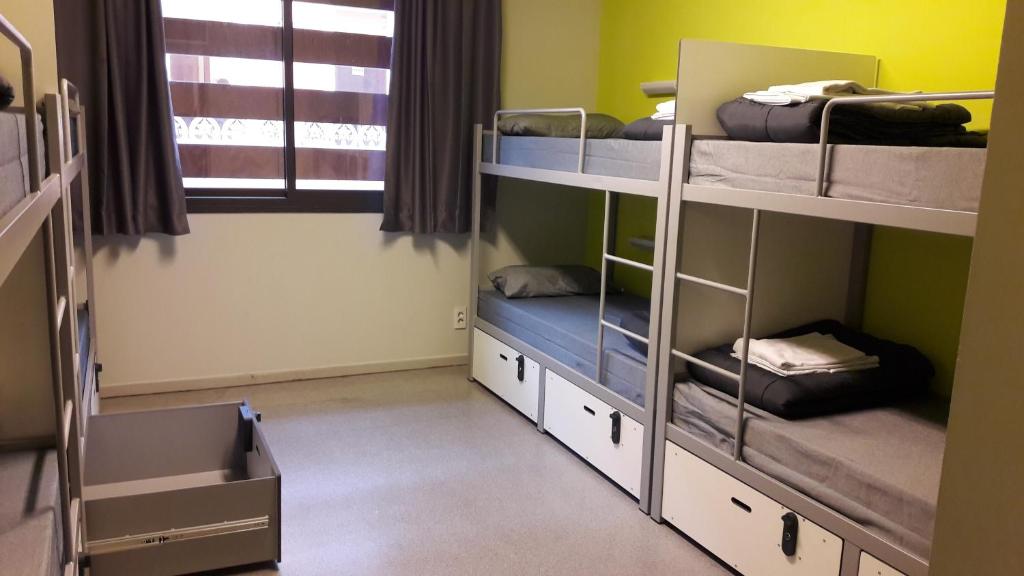 Postel nebo postele na pokoji v ubytování Alberg Pere Tarrés