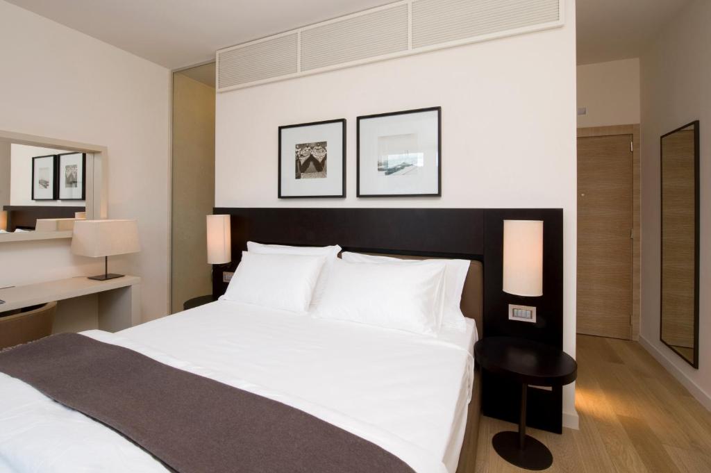 Postel nebo postele na pokoji v ubytování Marina Place Resort