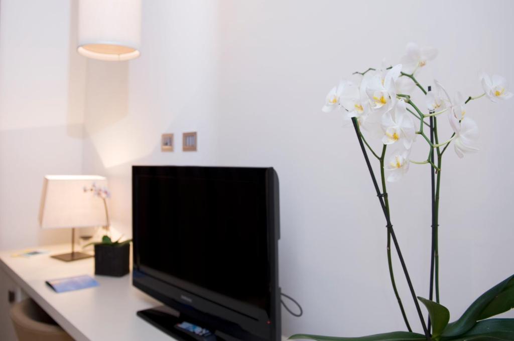 TV a/nebo společenská místnost v ubytování Marina Place Resort